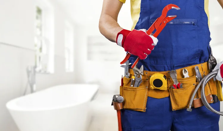 The torso of plumbing technician showing a tool belt from TMK Plumber Austin in Kyle, TX - Kyle TX